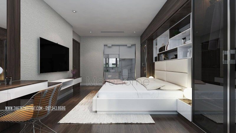 Không để cho mảng tường đầu giường có sự trống trải KTS đã thiết kế kệ trang trí, tủ quần áo gỗ công nghiệp áo ngay mảng tường này tận dụng không gian làm căn phòng thêm rộng rãi